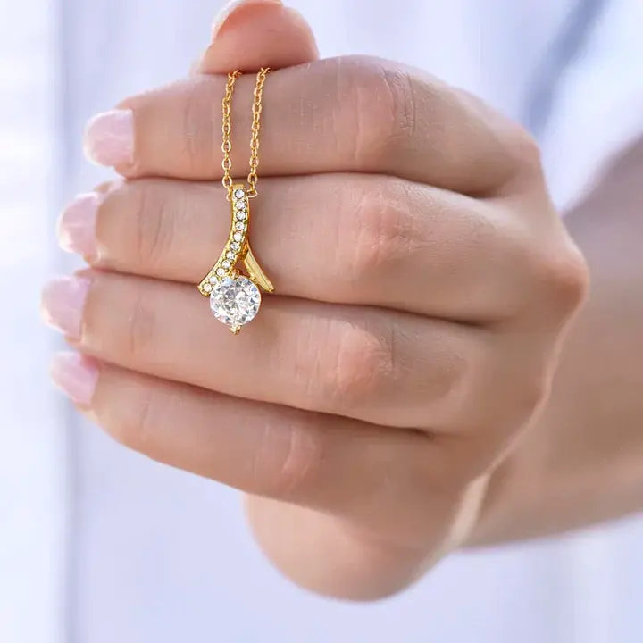 Necklace with zircons in old gold color