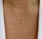 Gold necklace with chain and pendant in vintage style