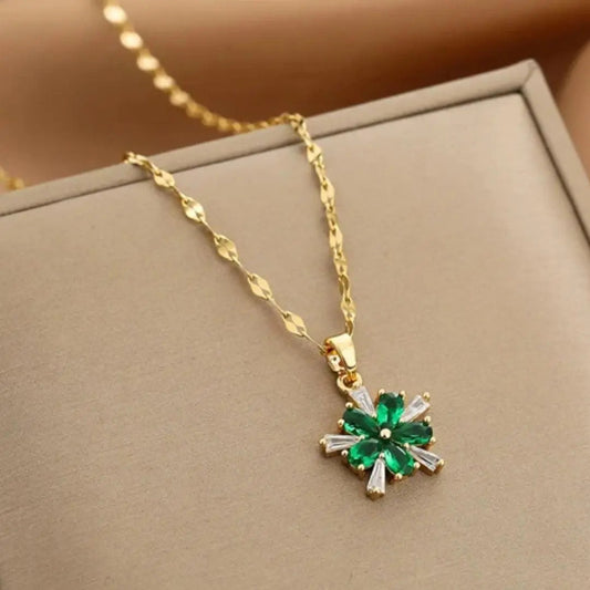Gold necklace with green crystal