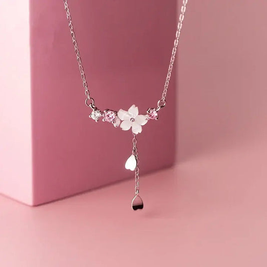 Floral necklace with pink stones in silver color