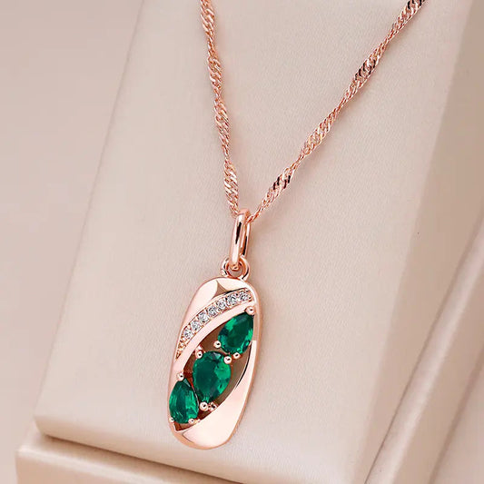 Gold necklace with green crystal