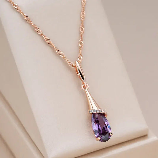 Elegant necklace with crystal drops in purple color