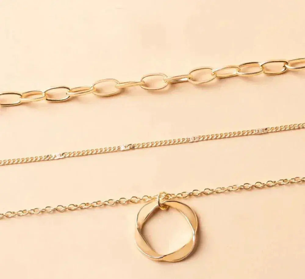 Gold necklace with chain and pendant in vintage style