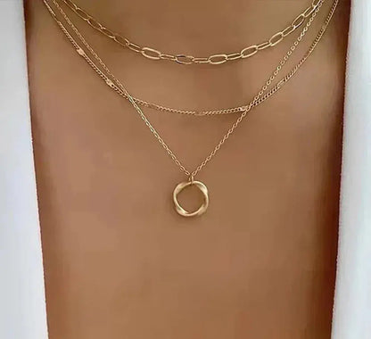 Gold necklace with chain and pendant in vintage style